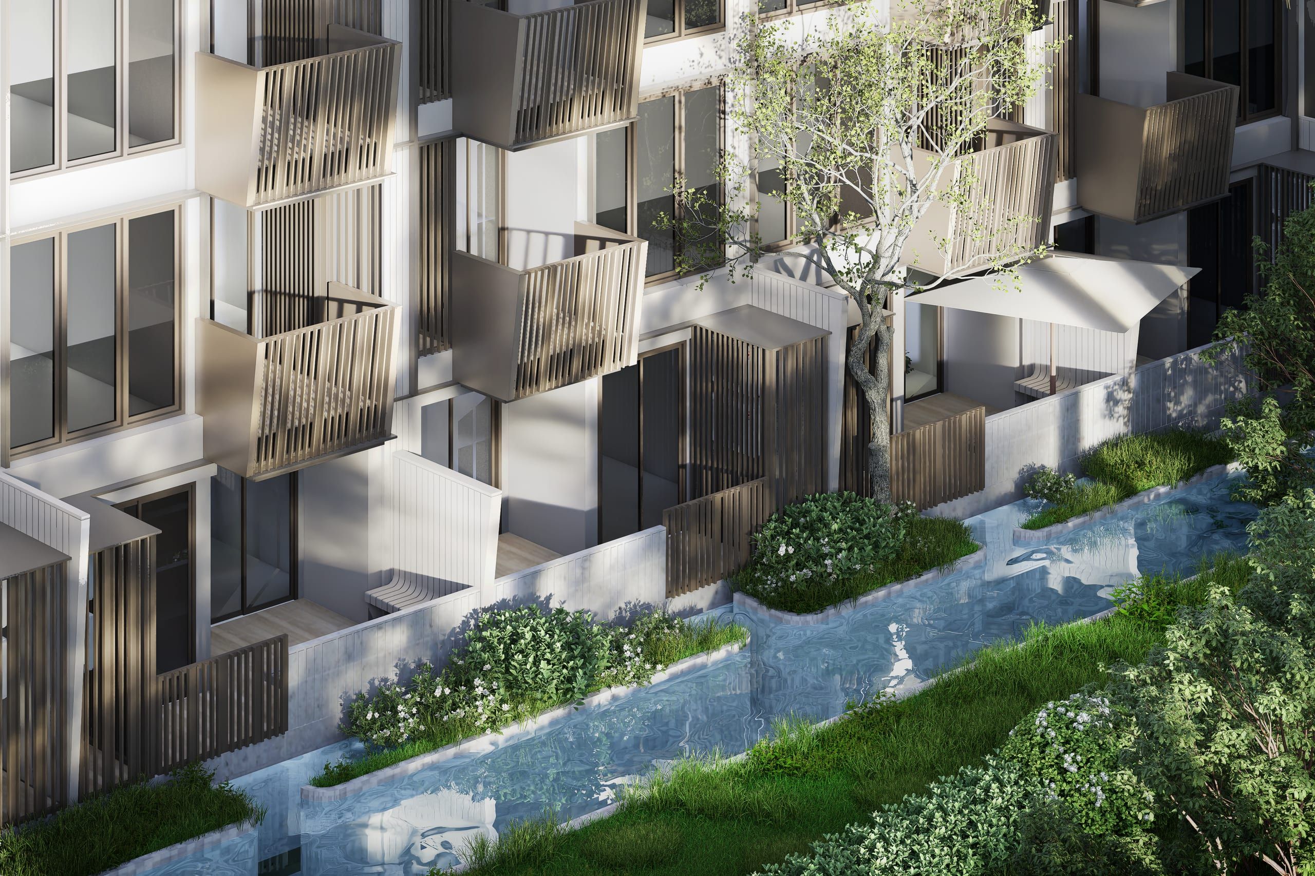 Terraces with parasols and slatted balconies above a lagoon channel, lawn and a slender tree in the foreground, visualisation