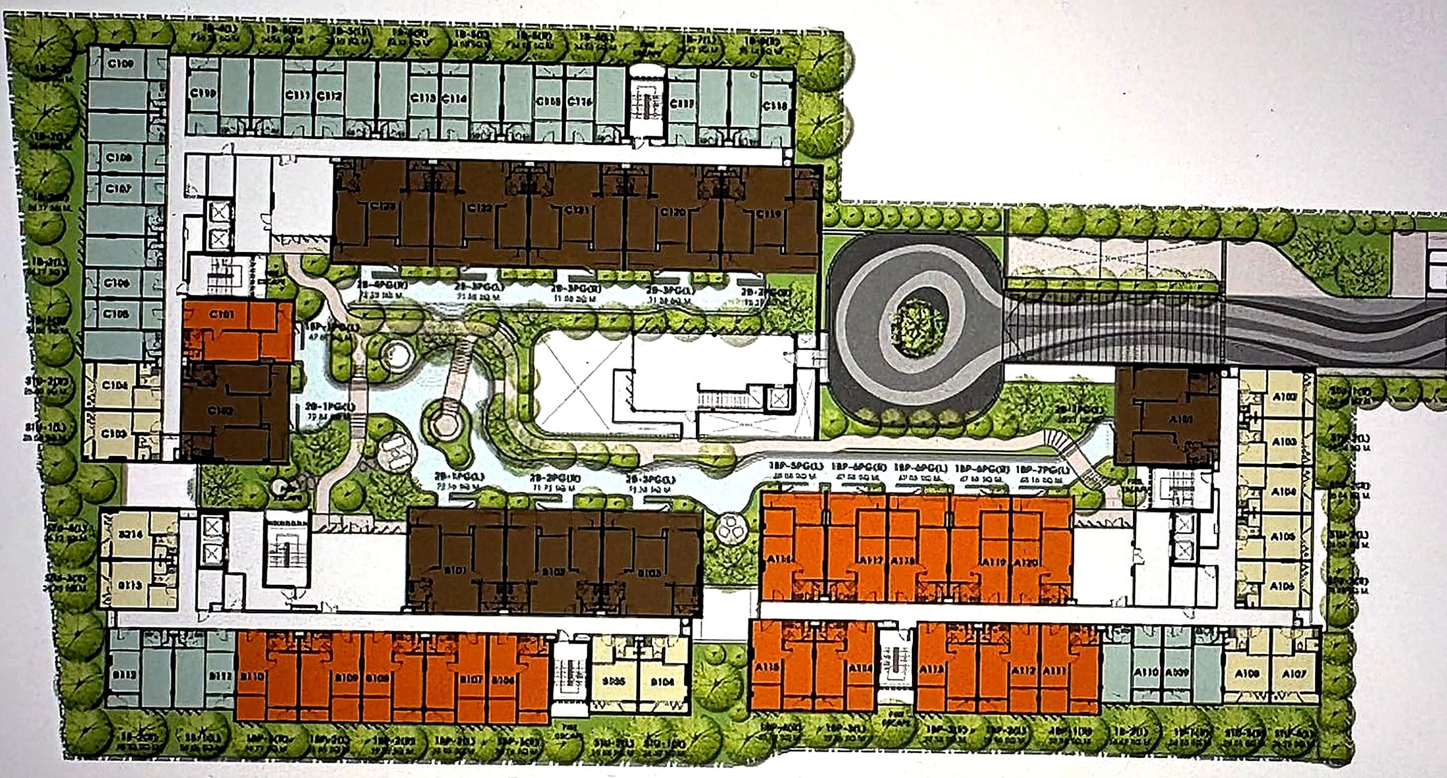 Colour-coded site plan of three residential blocks around a landscaped central garden with water features